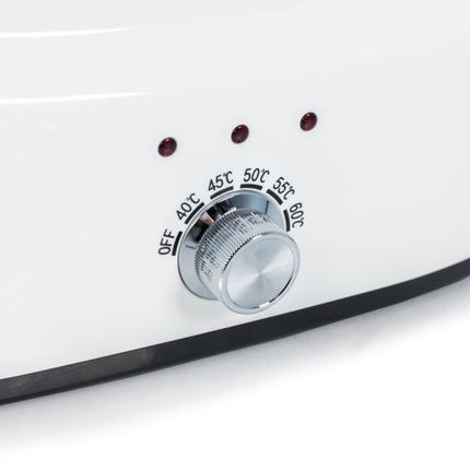Massageolie verwarmer voor 3 flessen - demassageshop.nl